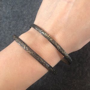 2 golden blackening bracelets with print